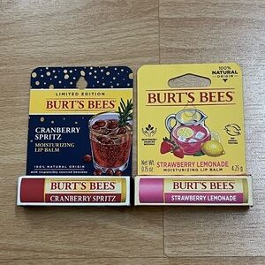 Burt’s Bees moisturizing lip balm in Cranberry Spritz and Strawberry Lemonade